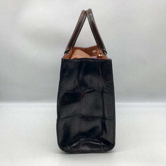 Elevate your style with this stunning Dooney & Bourke Janine  Dooney & Bourke Brown Croc Embossed Leather Janine Convertible Satchel